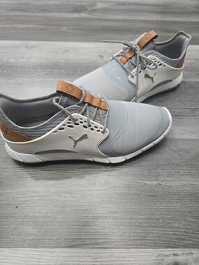 PUMA Ignite Pwrsport spikeless golf shoes in a gray and white colorway